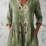 Rina | Blusa lunga con scollo a V