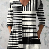 Adele | Blusa lunga con scollo a V