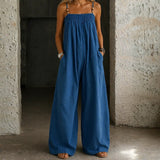 Nicole | Salopette in jeans a gamba larga