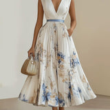 Camilla | Abito midi plissettato in chiffon bianco a fiori con scollo a V