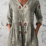 Rina | Blusa lunga con scollo a V