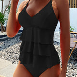Lia | Costume elegante con balze raffinate