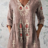 Rina | Blusa lunga con scollo a V
