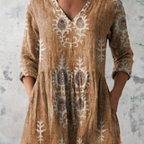 Rina | Blusa lunga con scollo a V