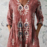 Rina | Blusa lunga con scollo a V