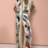 Olimpia | Completo camicia e pantaloni in raso con stampa originale in stile resort