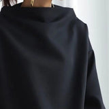 Nora | Top casual con collo alto