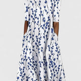 Olivia | Abito midi floreale con tasche