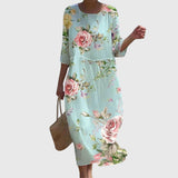 Sandra | Abito lungo a fiori elegante
