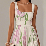 Isabella | Abito lungo plissettato in chiffon bianco a fiori
