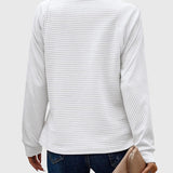 Nora | Maglione elegante con mezza zip