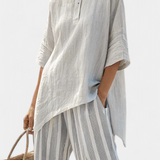 Penelope | Completo con blusa asimmetrica e pantaloni a righe