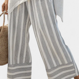 Penelope | Completo con blusa asimmetrica e pantaloni a righe