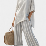 Penelope | Completo con blusa asimmetrica e pantaloni a righe