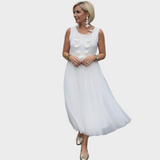 Miriam | Completo due pezzi con blusa e abito senza maniche